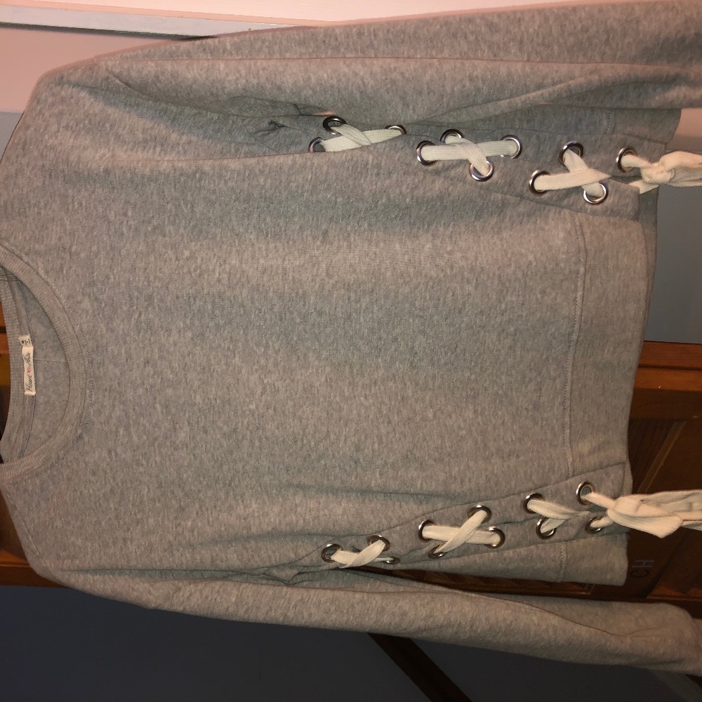 trendy boutique lace up sweater NWT